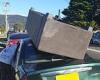 Disqualified Wollongong driver spotted moving an unsecured couch on the roof of ...