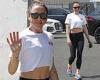Mel C flashes her taut abs in a white crop top and leggings