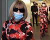 Anna Wintour shows off her signature style in a colourful satin dress