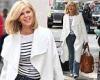Kate Garraway wows with a stylishly casual look as she carries luggage to  in ...
