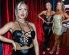Eve Gale showcases her ample cleavage in a skimpy leather bra at London Fashion ...