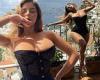 Demi Rose flaunts her VERY ample cleavage in a racy black corset on her lavish ...