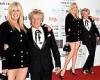 Sir Rod Stewart cosies up to Penny Lancaster as she puts on a VERY leggy ...