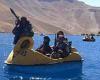 Armed Taliban fighters ride PEDALOS on lake in Afghanistan national park