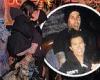 Kourtney Kardashian jumps into beau Travis Barker's arms for a kiss at Knott's ...