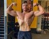 Arnold Schwarzenegger's son Joseph Baena, 23, flashes his muscles