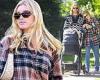 Elsa Hosk snuggles up to her boyfriend Tom Daly during relaxing stroll with ...