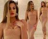 Khloe Kardashian sizzles in a see-through netted dress