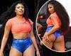 Megan Thee Stallion puts on eye-popping display in bright orange crop top and ...