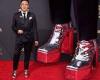 Bowen Yang stands tall in silver platform HEELS as he leads SNL nominees at ...