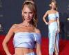 Juno Temple puts her toned abs on display in satin ice blue cropped dress at ...