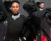 Pose star Billy Porter flaunts his fanned sleeves at the Emmy Awards