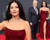 Catherine Zeta-Jones hits the red carpet in a burgundy strapless gown at the ...