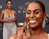 Issa Rae leaves little to the imagination in a glitzy netted gown at the Emmy ...
