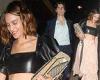 Alexa Chung shows off her slender midriff in a leather crop top as she leaves ...