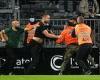 sport news Marseille and Angers fans storm the pitch and fight each other after Ligue 1 ...