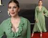 Katherine Ryan puts on a busty display in a plunging green ruffled dress at the ...