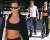 Bella Hadid cuts an athletic figure in a black sports bra while out with ...