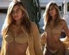 Love Island's Arabella Chi wows in a racy gold bikini as she poses for a steamy ...