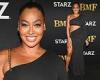 La La Anthony showcases her toned figure while rocking a black cut-out dress at ...