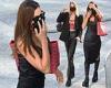 Irina Shayk flaunts her curves in a silk slip as she steps out at MFW with ...
