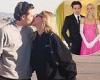 Brooklyn Beckham and Nicola Peltz pucker up for a steamy smooch on the airport ...