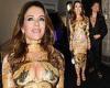 Elizabeth Hurley attends Versace event with her son Damian Charles at Milan ...