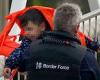 Border Force official carries screaming boy to safety after packed migrant boat ...