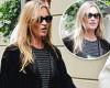 Kate Moss is the picture of elegance in a grey-and-black stripy top during ...
