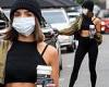 Olivia Culpo shows off her incredibly toned abs in a crop top as she picks up a ...