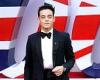 Bond villain Rami Malek looks dapper in a black tuxedo at the world premiere of ...
