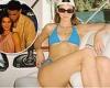Kendall Jenner poses  in a tiny blue bikini and backwards cap on a speedboad