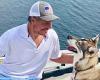 Andrew Cuomo and dog 'Captain' relax on a boat after former governor 'tried to ...