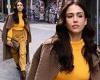 Jessica Alba shows off her impeccable sense of style in a yellow sweater during ...