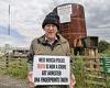 Angry farmer who faced court after erecting 15ft sign criticising his village ...