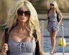 Victoria Silvstedt, 47, wows in a thigh-skimming denim mini skirt worn over a ...