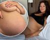Ashley Graham puts her burgeoning baby bump on display in a nude snap