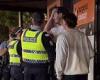 AFL star is filmed in emotional conversation with police outside a nightclub