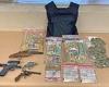 Guns, drugs and $143,000 in cash are seized in massive crackdown on organised ...