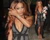 Alexandra Burke goes braless in a plunging mesh dress
