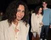 Minnie Driver cuts a stylish figure in an ivory trouser suit as she ...