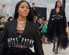 Naomi Campbell exudes glamour in bejewelled feathered ballgown