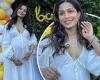 Freida Pinto shows off bump in a flowing white dress at her baby shower