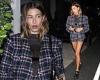 Hailey Bieber slips into a sheer top and plaid mini skirt while out for dinner ...