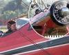 Tom Cruise takes to the skies in a World War II biplane