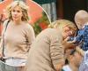 Sienna Miller looks relaxed in a taupe jumper and mom jeans