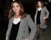 Jenna Coleman cuts a chic figure in a black dress and patterned coat