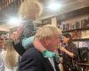Boris Johnson gives son Wilfred a shoulder ride at father's book launch in ...