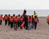 Dozens of migrants land on beach in Kent escorted by the RNLI days after 1,568 ...