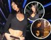 Bella Hadid dares to bare toned tummy in a black crop top in snaps shared from ...